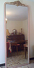 very tall crested french antique mirror